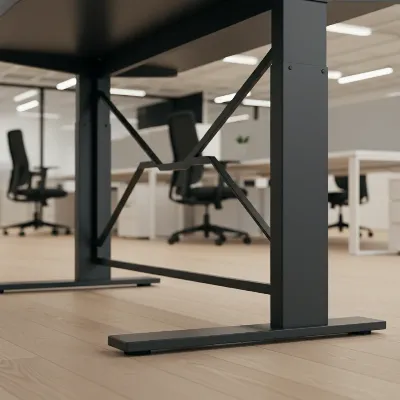 Close-up of the Ikea Idasen standing desk's steel frame and triangular tubing, highlighting its stability and robust construction.
